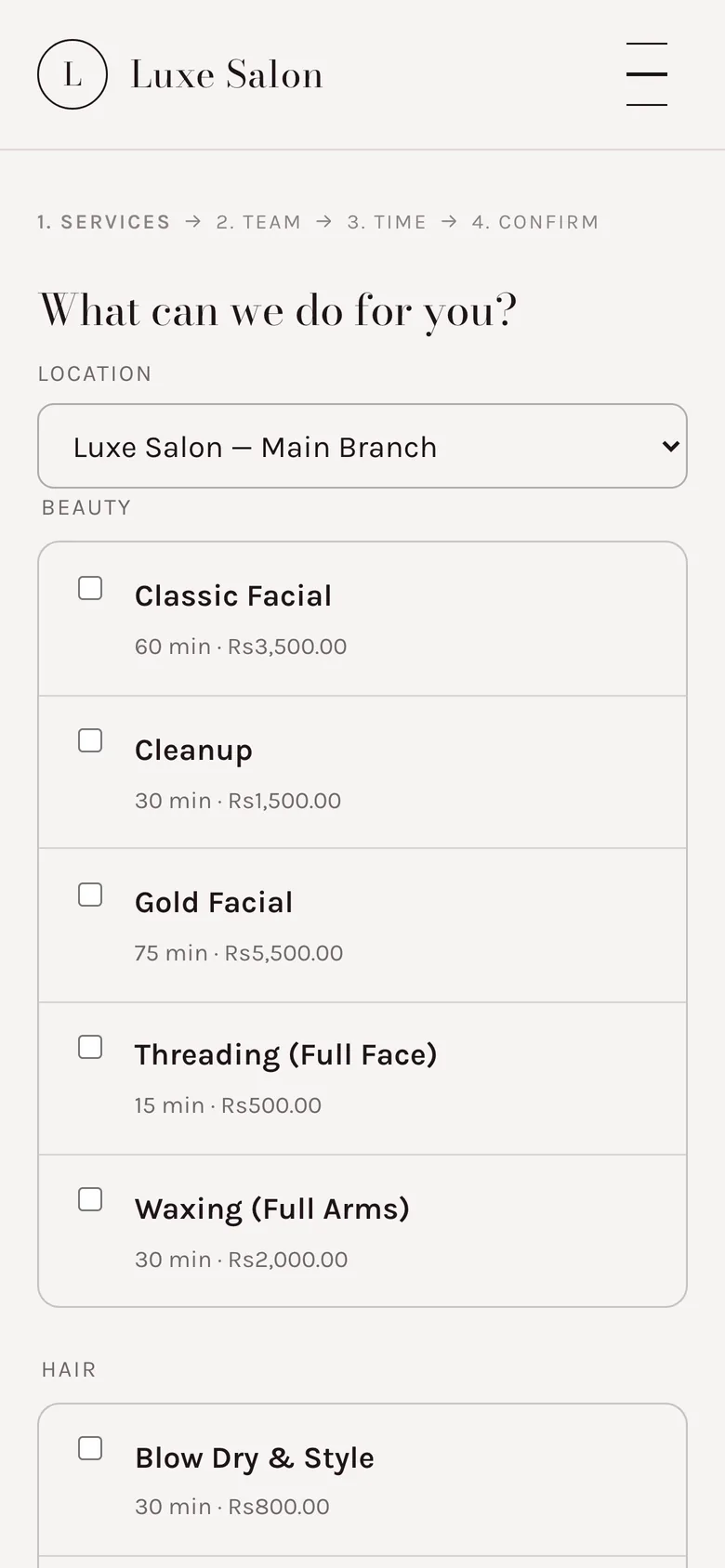 A salon's own StyleDesk booking page on a phone, showing services to choose from